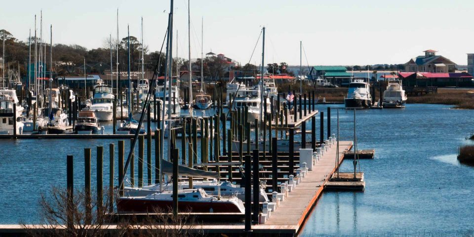Boats moored in a marina in Southport, NC