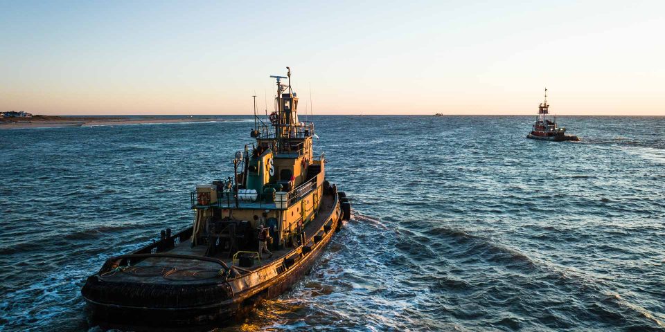 Fishing boats going out to sea off the coast of North Carolina